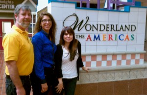 This year's Free Fine Arts Fair is Friday, July 26 at Wonderland of the Americas, Loop 410 & I-10 - San Antonio, 78201 Pictured: David B. Frank, ArtGives.Org; Victoria Hernandez, Wonderland of the Americas & Mary E. Cantu, spare parts